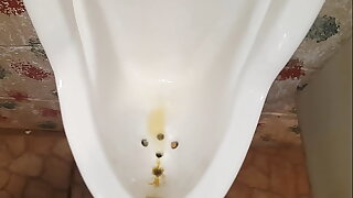 Pissing at public urinal, showing power of my kegel muscles ;)